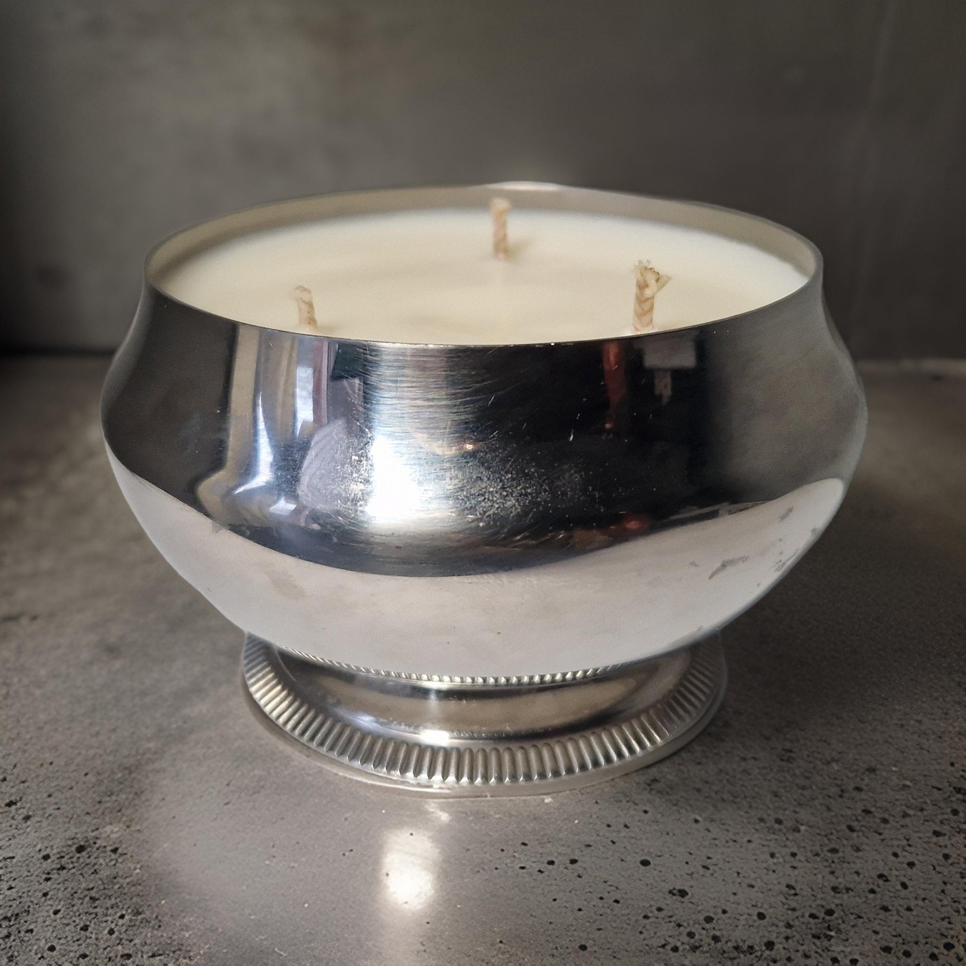 silver lidded sandalwood  candle