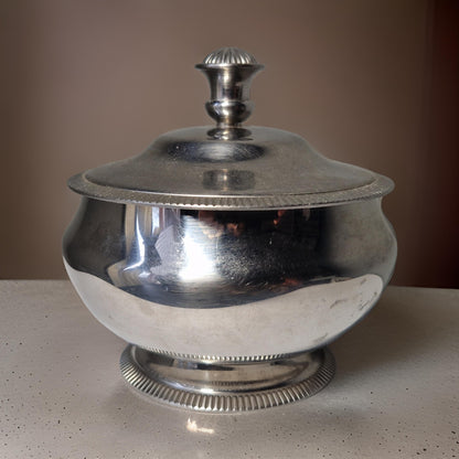 silver lidded sandalwood  candle