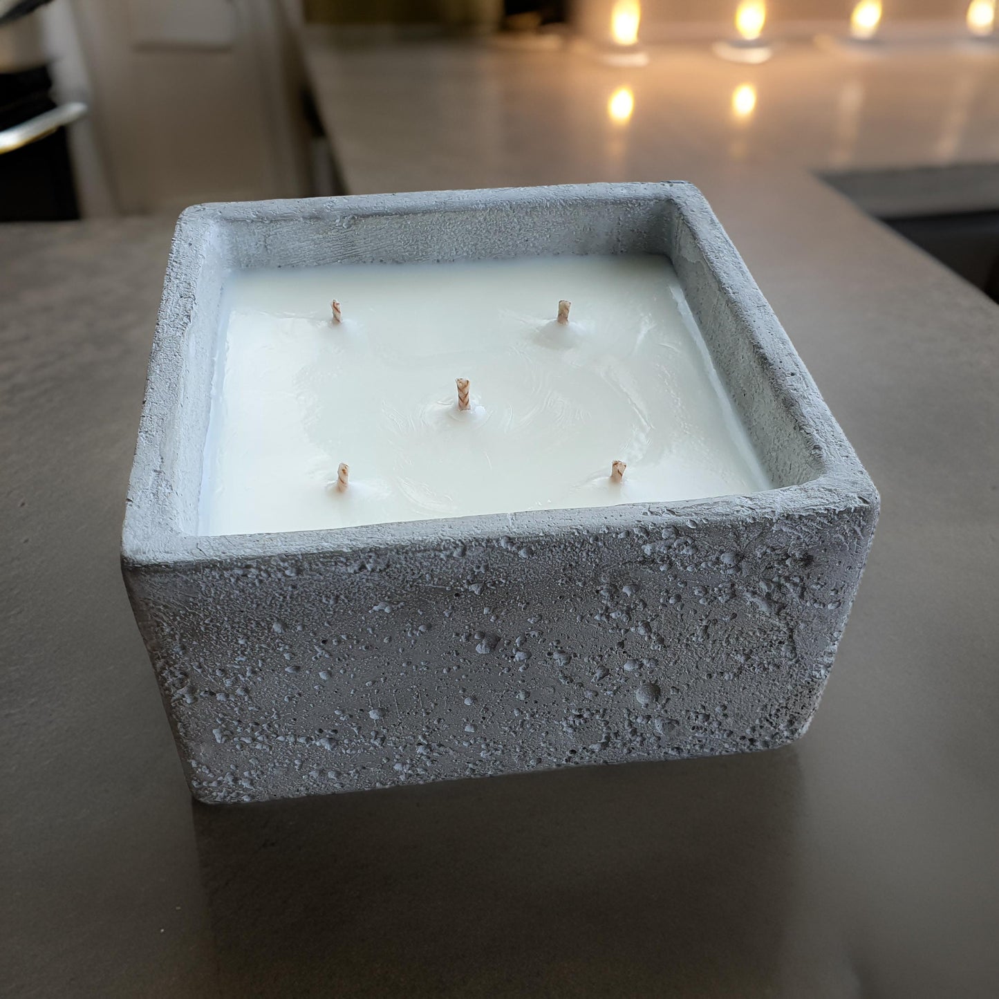 Urban candle in concrete square